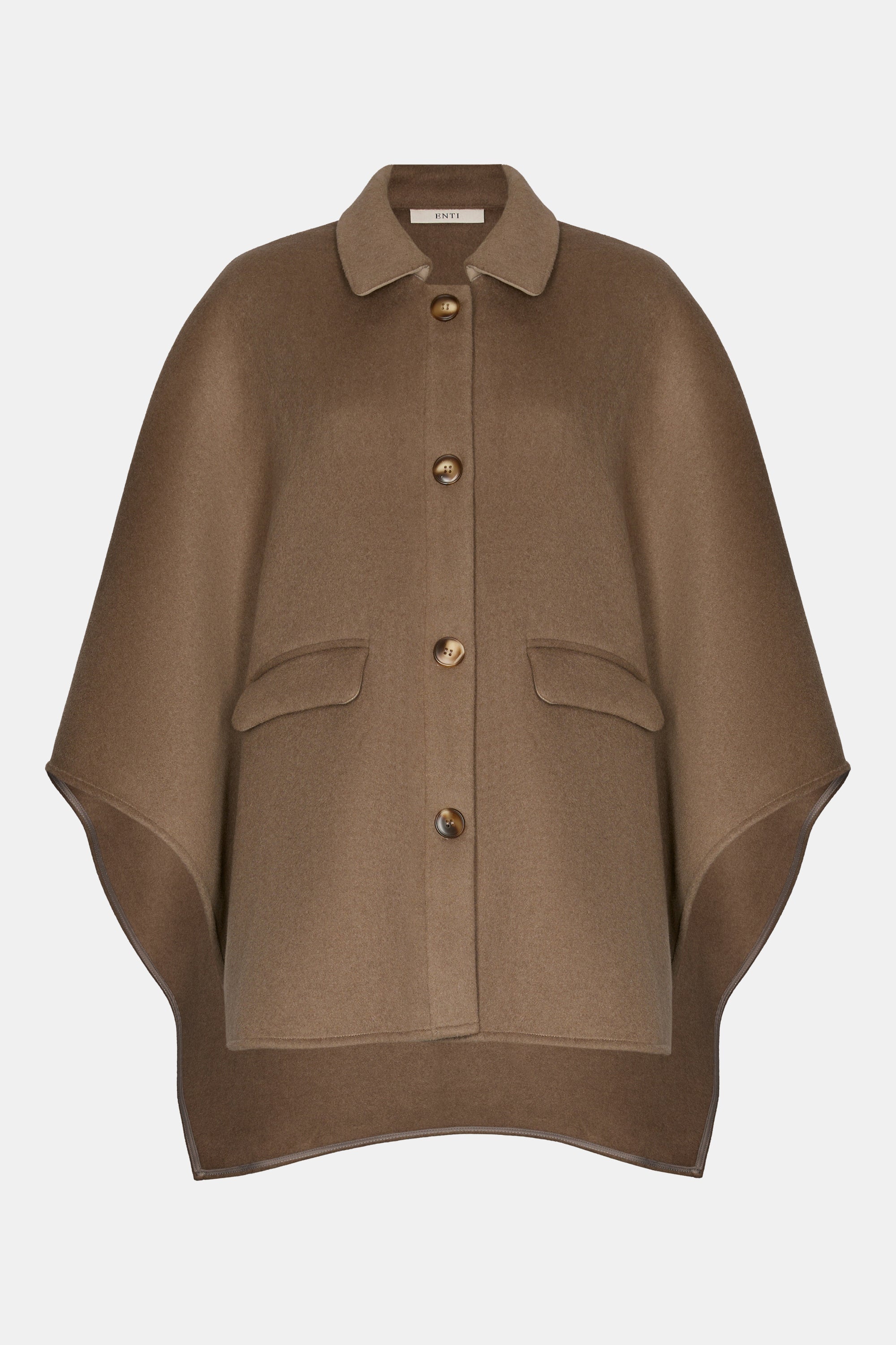 mannequin van de wollen poncho van het modest merk enti in de kleur bruin